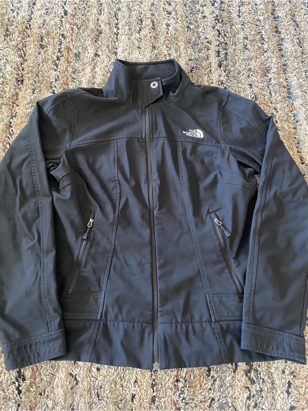 The North Face Women Black Windbreaker Jacket.